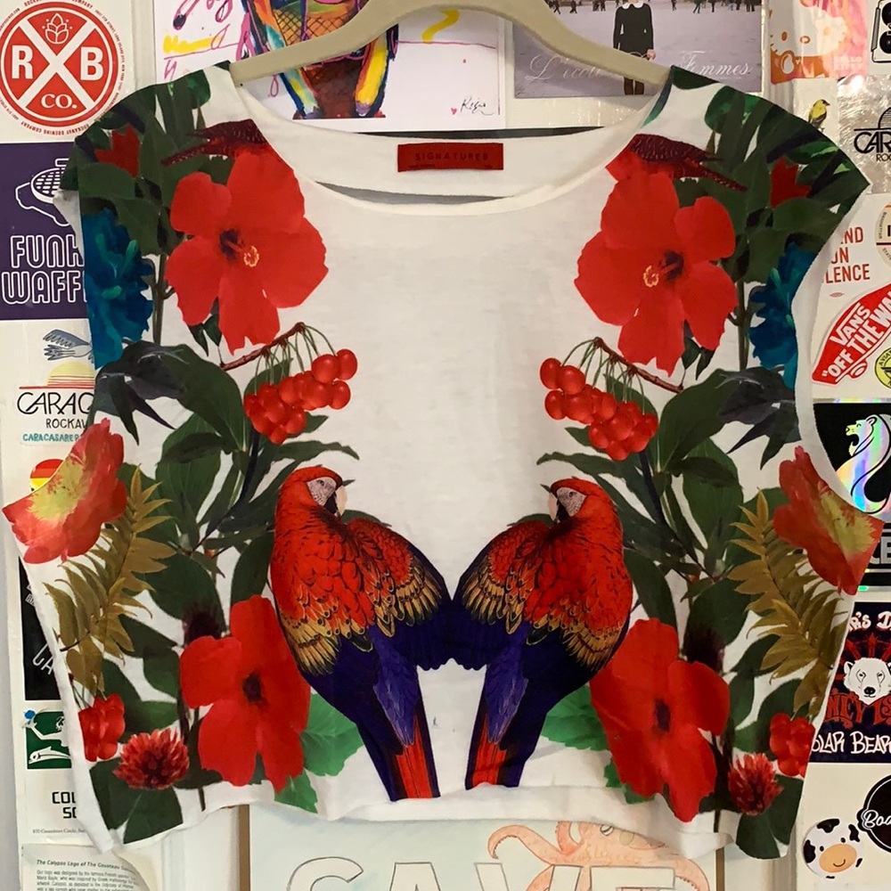 White crop top with floral and parrot print.